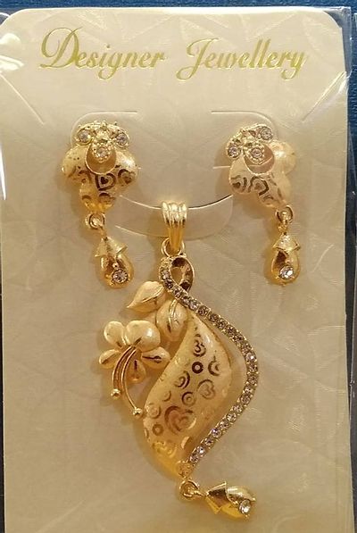 Radiant Gold Pendant and Earrings Set